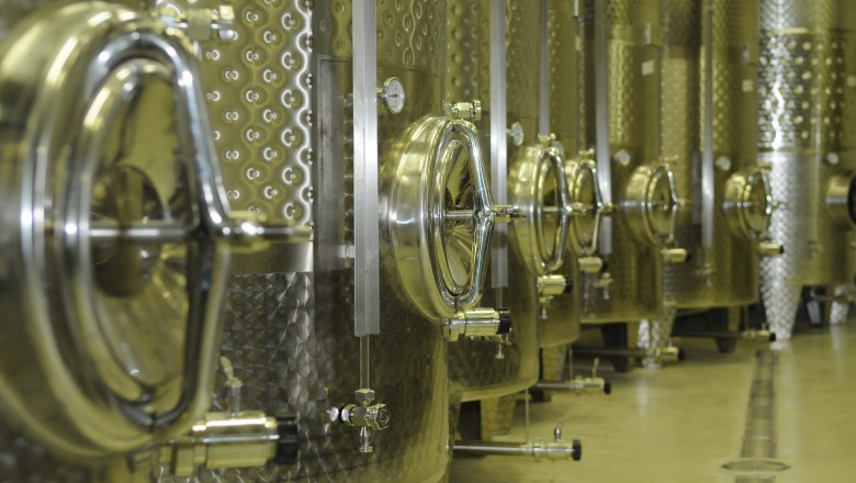 TDR-Winery Haimel Cellar, © Weingut Haimel Row of stainless steel tanks in a wine cellar.
