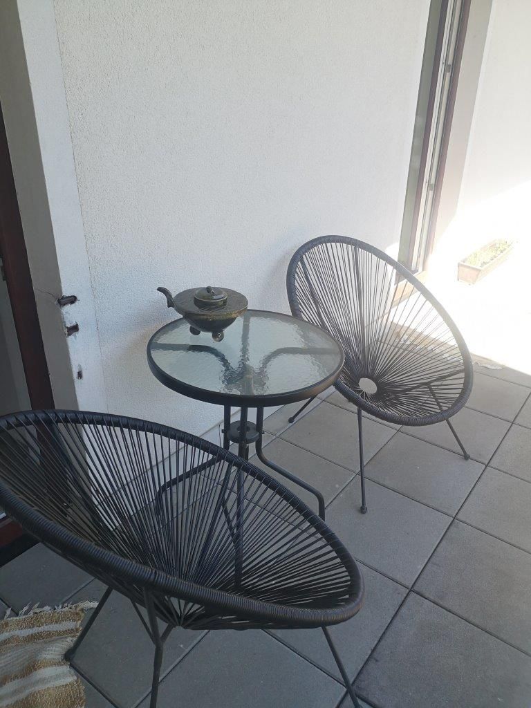 Balkon mit Sitzgelegenheit